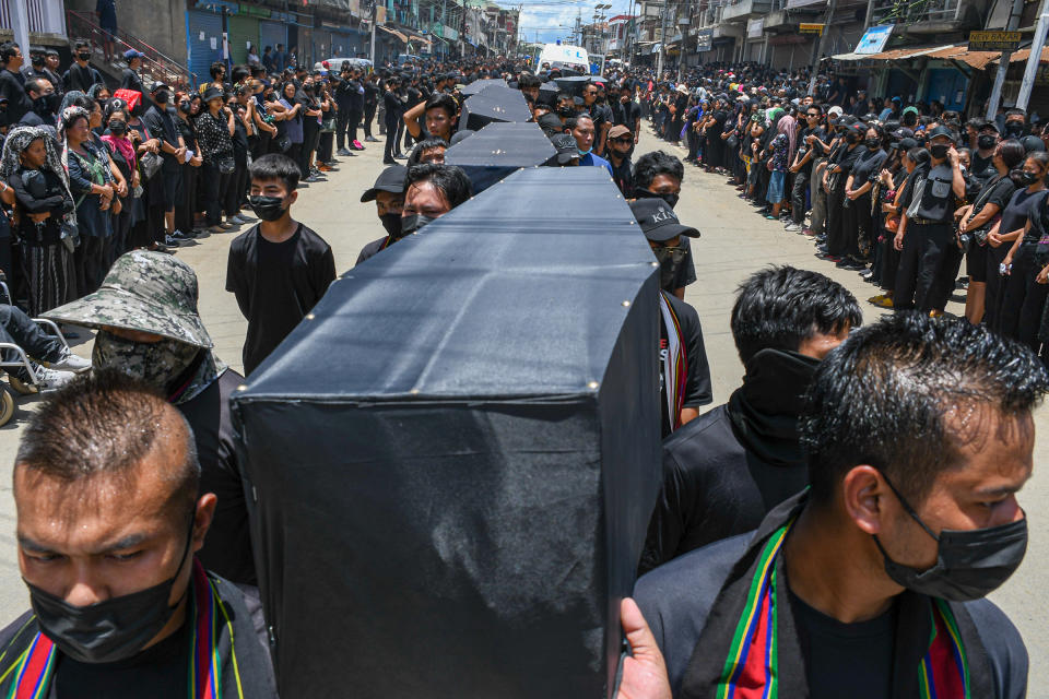 Residents of Churachandpur take part in a silent march while carrying dummy coffins to commemorate all the tribal people who lost their lives in the ethnic clashes in Manipur on June 23.<span class="copyright">Biplov Bhuyan—SOPA Images/LightRocket/Getty Images</span>