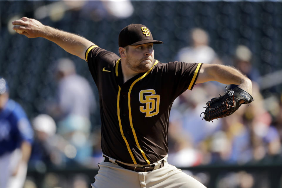 FILE - San Diego Padres pitcher David Bednar throws during the third inning of a spring training baseball game against the San Diego Padres in Surprise, Ariz., in this Monday, Feb. 24, 2020, file photo. The San Diego Padres brought right-hander Joe Musgrove to his hometown team Tuesday, adding yet another starting pitcher in a seven-player trade involving the Pittsburgh Pirates and New York Mets. The Padres, who believe they can contend for the World Series title, will send major league reliever David Bednar and three prospects —outfielder Hudson Head, left-hander Omar Cruz and right-hander Drake Fellows — to the Pirates. As part of the agreement, the Padres will send left-hander Joey Lucchesi to New York, and the Pirates will receive catcher Endy Rodríguez from the Mets. (AP Photo/Charlie Riedel)