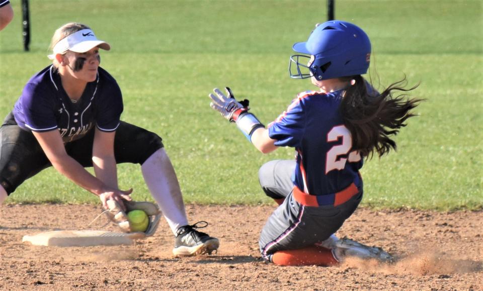 West Canada Valley shortstop Jenna Beam (left) prepares to tag Poland Tornado McKenzie Parow on a stolen base attempt during the seventh inning Thursday.