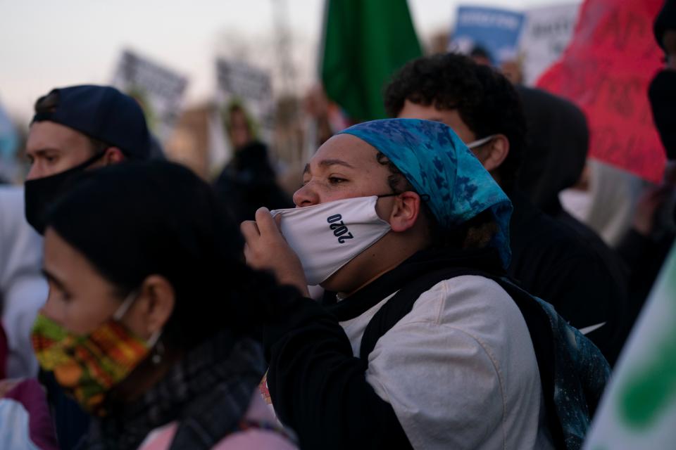 Community members protest the the fatal shooting of 13-year-old Adam Toledo by a Chicago officer Friday April 15, 2021 in Chicago's Logan Square neighborhood.