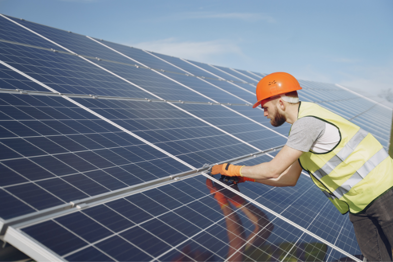 Man Installing Solar Panel