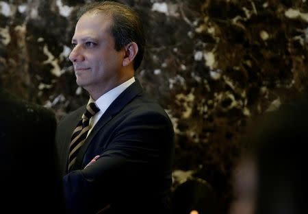 Preet Bharara, the U.S. Attorney for the Southern District of New York stands by the elevators upon his arrival at Trump Tower to meet with U.S. President-elect Donald Trump in New York, U.S., November 30, 2016. REUTERS/Mike Segar