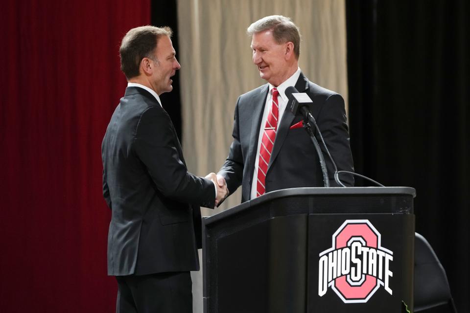 Jan 17, 2024; Columbus, OH, USA; Ohio State president Ted Carter, right, introduces Ross Bjork as the university’s new athletic director during a press conference at the Covelli Center.