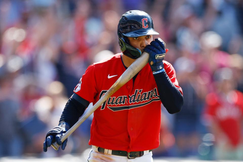 Guardians second baseman Andres Gimenez kisses his bat after hitting a game-winning, two-run home run against the Minnesota Twins during the ninth inning Thursday, June 30, 2022, in Cleveland.