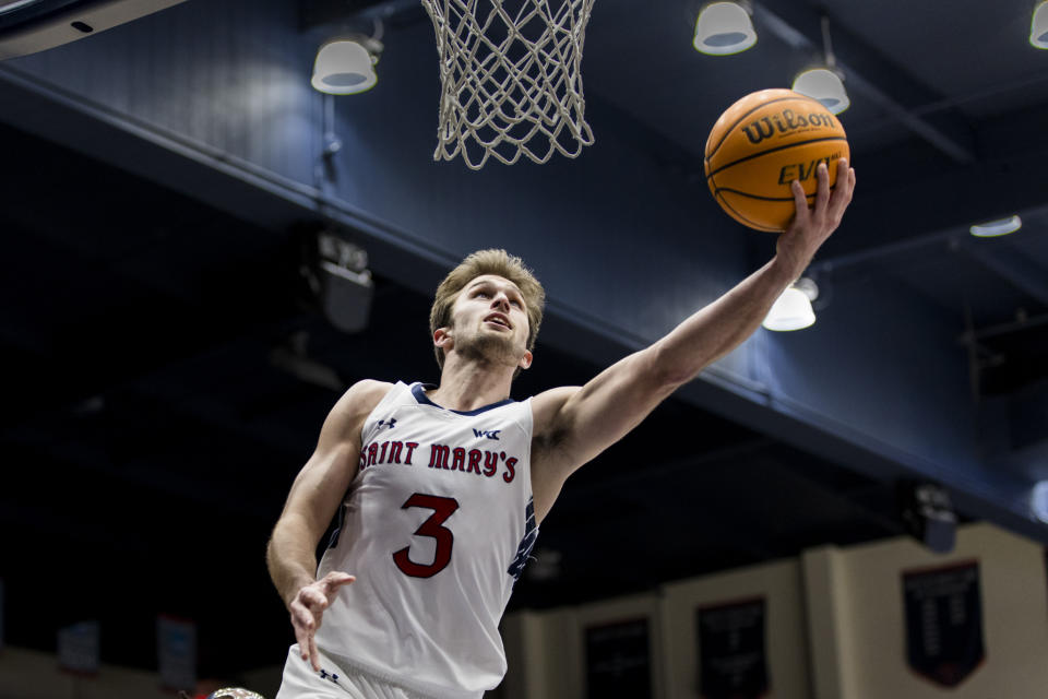 Saint Mary's guard Augustas Marciulionis lays up the ball against San Diego during the first half of an NCAA college basketball game in Moraga, Calif., Saturday, Feb. 24, 2024. (AP Photo/John Hefti)