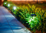 <body> <p>Illumination enhances your outdoor spaces, but it's also important for safety and security—and these are all good reasons to brighten up your yard. Start by purchasing low-voltage landscape lighting, which plugs into any outdoor GFCI outlet. Plan the placement of the lights, dig a narrow trench to bury the cable, then plug in the transformer. Then, make the electrical connections and <a rel="nofollow noopener" href=" http://www.bobvila.com/slideshow/13-diy-lanterns-to-illuminate-your-porch-patio-or-garden-47334#.V40qyJMrKRs?bv=yahoo" target="_blank" data-ylk="slk:install the lights;elm:context_link;itc:0;sec:content-canvas" class="link ">install the lights</a>. If this all feels like too much effort, think solar—lights that have no wiring are snap to set up!</p> <p><strong>Related: <a rel="nofollow noopener" href=" http://www.bobvila.com/slideshow/8-new-ideas-for-diy-outdoor-lighting-48892#.V40m8JMrKRs?bv=yahoo" target="_blank" data-ylk="slk:8 New Ideas for DIY Lighting;elm:context_link;itc:0;sec:content-canvas" class="link ">8 New Ideas for DIY Lighting</a> </strong> </p> </body>