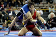 Clarissa Chun (red) wrestles Alyssa Lampe (blue) in the 48 kg freestyle weight class during the finals of the US Wrestling Olympic Trials at Carver Hawkeye Arena on April 22, 2012 in Iowa City, Iowa. (Matthew Stockman/Getty Images)