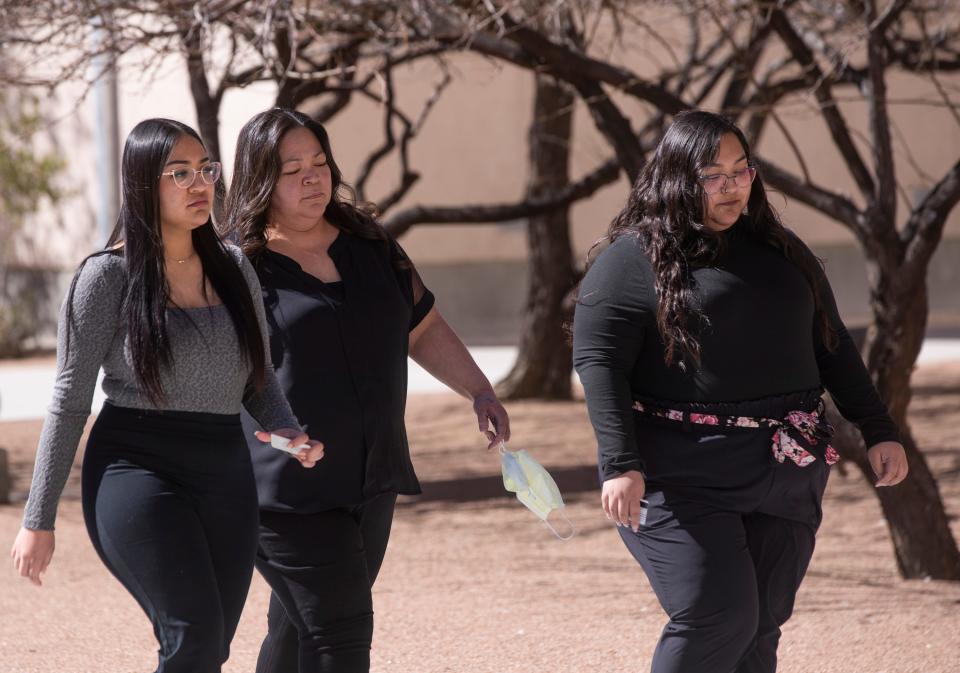 Members of a Walmart mass shooting victim's family arrive at the Albert Armendariz Sr. U.S. Courthouse in El Paso Wednesday, where they witnessed an admitted white supremacist plead guilty to 90 federal charges in connection with the Aug. 3, 2019, mass shooting. Twenty-three shoppers from the U.S. and Mexico were killed in the racist attack.