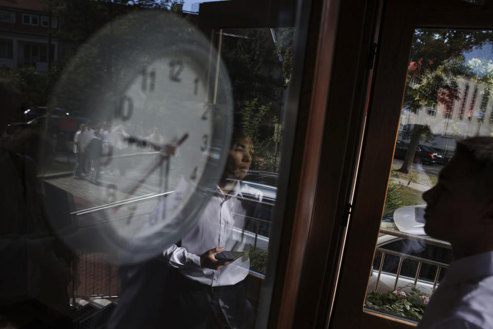 Students attend the beginning of a new school year at the Limanowski High School in Warsaw, Poland, Thursday, Sept. 1, 2022. The public schools in Poland are facing a shortage of teachers, a problem that is growing increasingly serious each year as people leave the profession over low wages and policies of a government which they fear does not value them. A teachers union and teachers say the situation threatens the education of the country's youth, though the government insists that they are exaggerating the scale of the problem. (AP Photo/Michal Dyjuk)