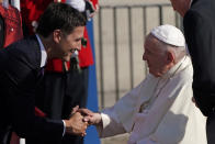 Canadian Prime Minister Justin Trudeau greets Pope Francis at the Citadelle de Quebec, Wednesday, July 27, 2022, in Quebec City, Quebec City, Quebec. Pope Francis is on a "penitential" six-day visit to Canada to beg forgiveness from survivors of the country's residential schools, where Catholic missionaries contributed to the "cultural genocide" of generations of Indigenous children by trying to stamp out their languages, cultures and traditions. (AP Photo/John Locher)