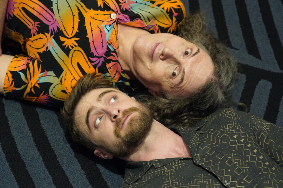 Daniel Radcliffe, left, and "Weird Al" Yankovic pose together for a portrait at the Bisha Hotel, during the Toronto International Film Festival, Thursday, Sept. 8, 2022, in Toronto. Radcliffe plays Yankovic in the film "Weird: The Al Yankovic Story." (AP Photo/Chris Pizzello)