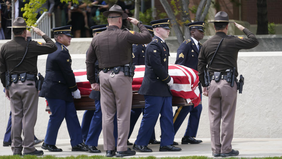 Members of the Utah Army National Guard carry the casket of former Utah Sen. Orrin Hatch during funeral services at The Church of Jesus Christ of Latter-day Saints' Institute of Religion Friday, May 6, 2022, in Salt Lake City. Hatch, the longest-serving Republican senator in history and a fixture in Utah politics for more than four decades, died last month at the age of 88. (AP Photo/Rick Bowmer)