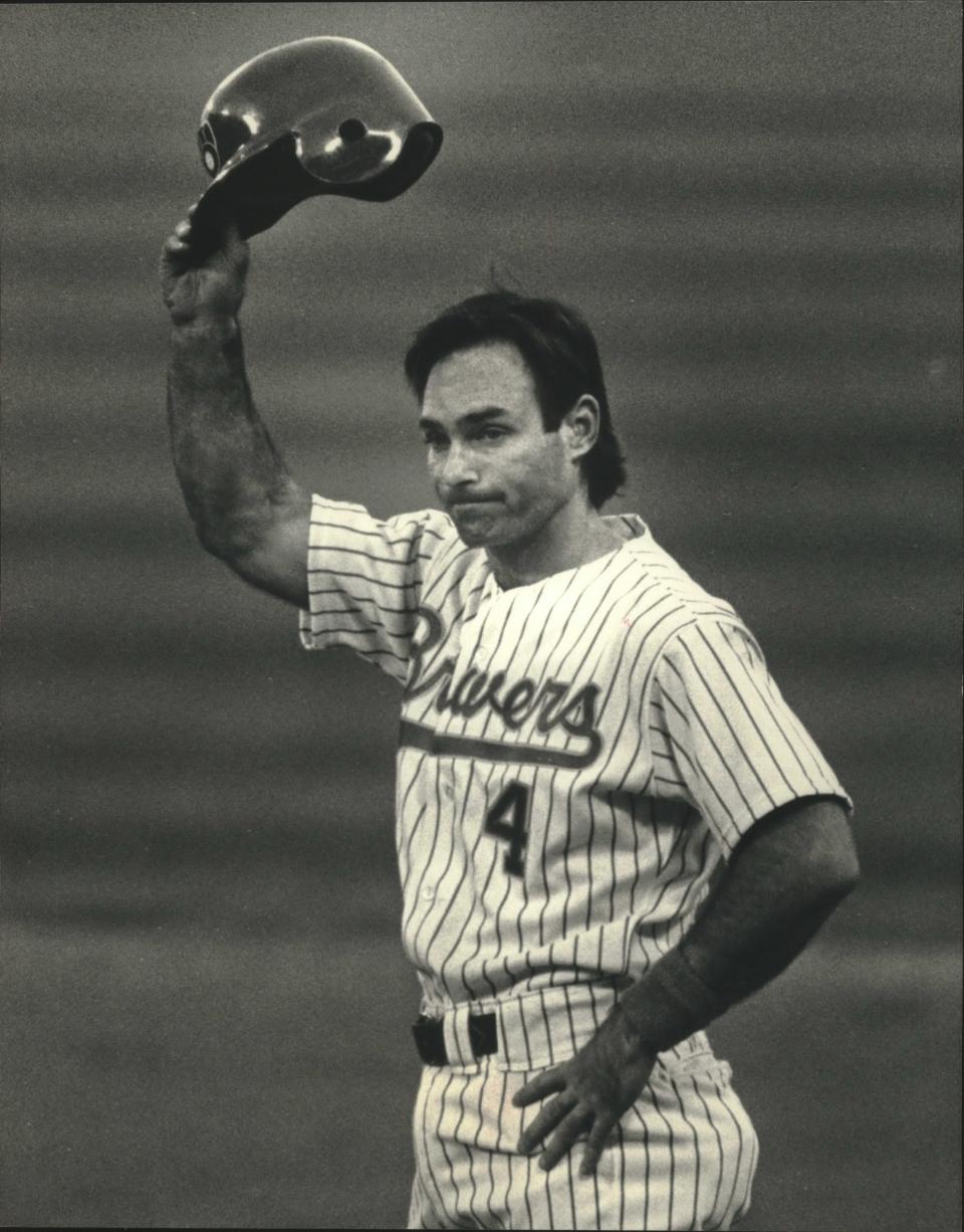 Paul Molitor acknowledges the cheers of the County Stadium crowd after collecting the 2000th hit of his major-league career. Molitor also hit for the cycle in his native Minnesota.