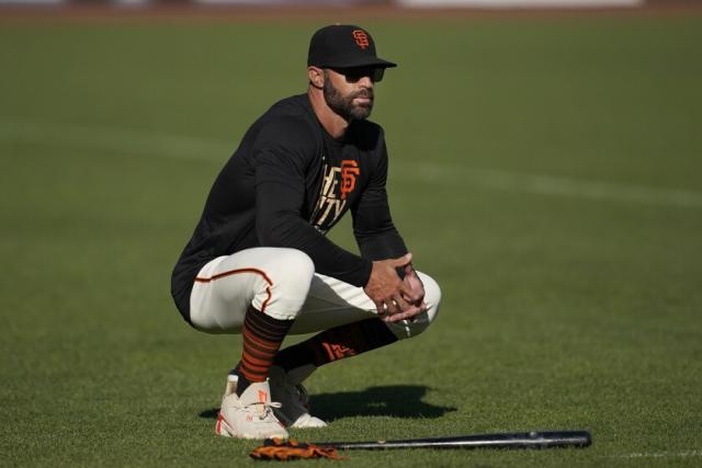 San Francisco Giants players, manager Gabe Kapler kneel during anthem