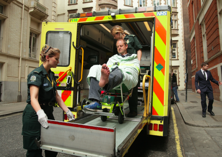 Mr Wooltorton was taken away by ambulance from the Labour manifesto signing (PA)