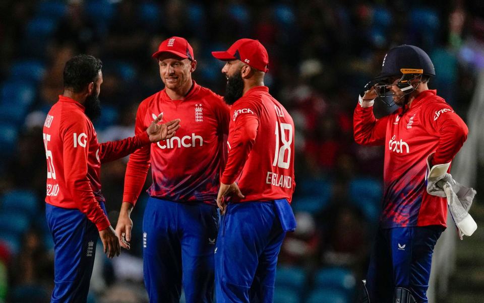 Rashid celebrates with his captain