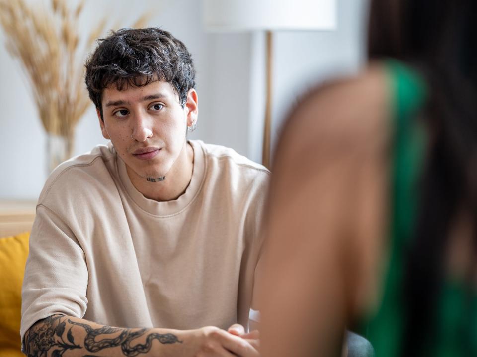 man listening to friend