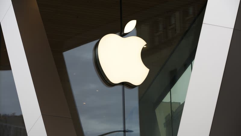 An Apple logo adorns the facade of the downtown Brooklyn Apple store on March 14, 2020, in New York. Apple is getting into the Buy Now, Pay Later space with a few tweaks to the existing model — including no option to pay with a credit card.