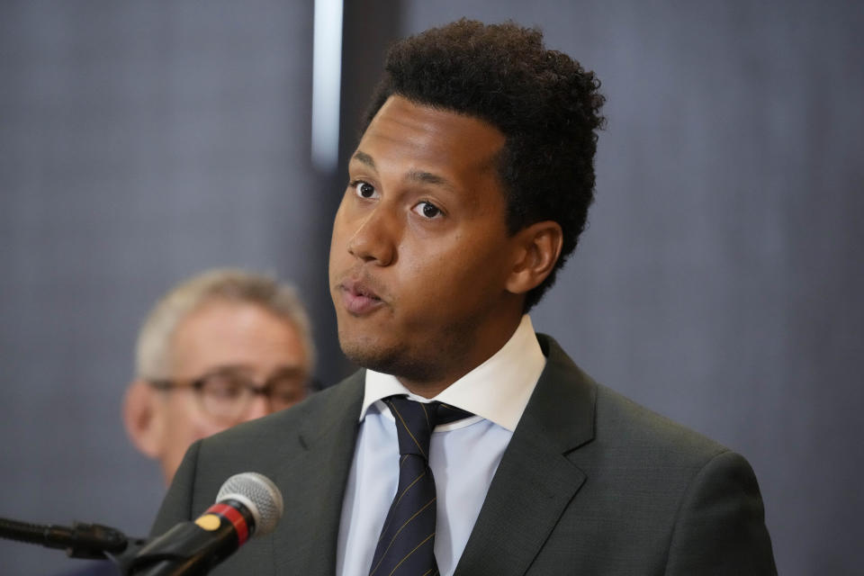 Former Northwestern quarterback Lloyd Yates listens to a question from the media at a news conference in Chicago, Monday, July 24, 2023. A Northwestern hazing scandal includes multiple sports, men and women, attorneys have said. (AP Photo/Nam Y. Huh)