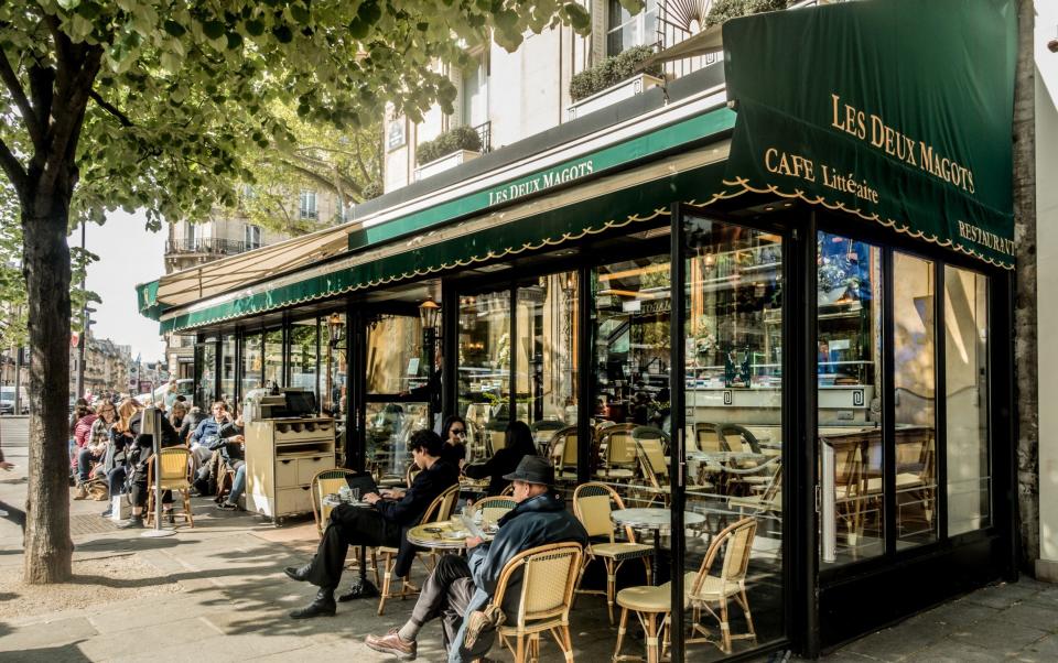 Famous Les Deux Magots in Paris is now flooded with tourists