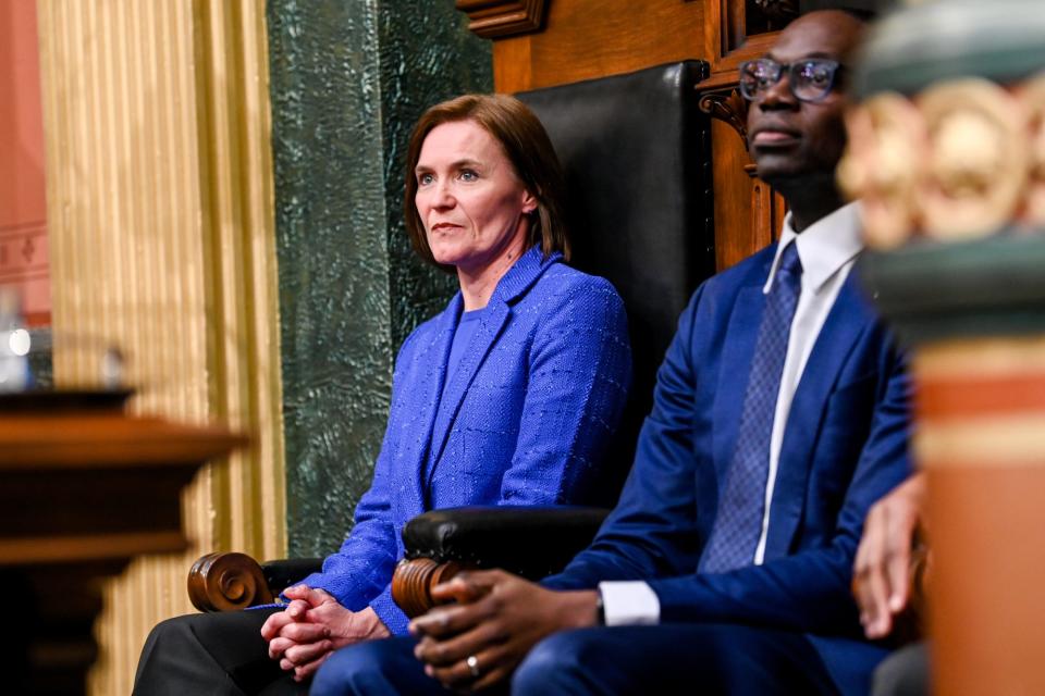 Senate majority leader Sen. Winnie Brinks, left, and Lt. Gov. Garlin Gilchrist listen during Gov. Gretchen Whitmer's State of the State address on Wednesday, Jan. 25, 2023, at the Michigan State Capitol in Lansing. 