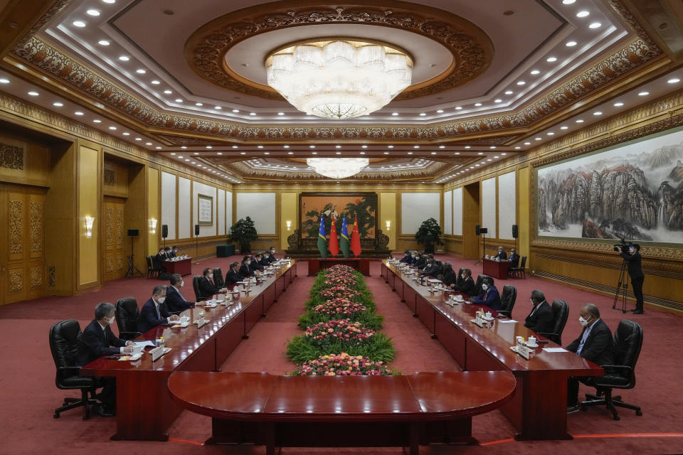 Visiting Solomon Islands Prime Minister Manasseh Sogavare, fifth from right, talks to his Chinese counterpart Li Qiang, fifth from left, during a bilateral meeting at the Great Hall of the People in Beijing, Monday, July 10, 2023. (AP Photo/Andy Wong, Pool)