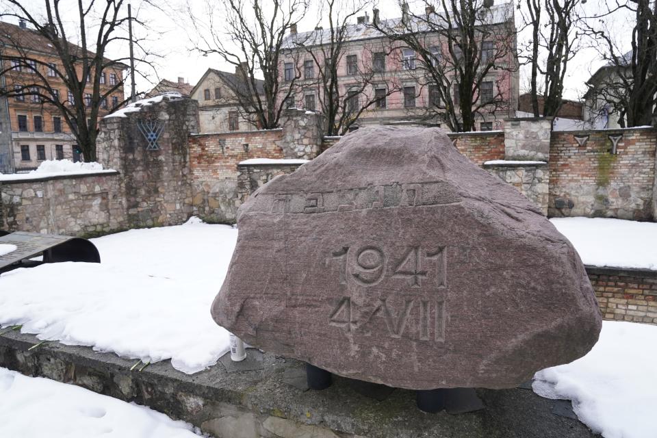 The memorial on the ruins of the Riga Choral Synagogue burned to the ground by Nazis in 1941, in memory of those who perished in the blaze, in Riga, Latvia, Thursday, Feb. 10, 2022. Latvia’s Parliament has passed a milestone Holocaust restitution bill after years of wrangling in a move that will provide compensation for lost prewar Jewish property and funding to revitalize the Baltic nation’s Jewish community that perished almost completely during World War II. (AP Photo/Roman Koksarov)