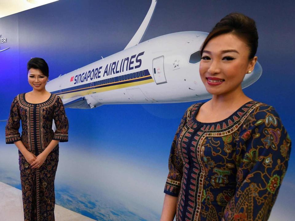 Singapore Airlines flight attendants.