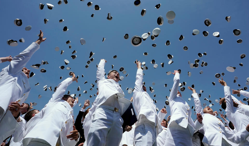 <p>Graduates toss their caps in the air upon the conclusion of the commissioning and graduation ceremony at the U.S. Naval Academy in Annapolis, Md., May 25, 2018. (Photo: Kevin Lamarque/Reuters) </p>