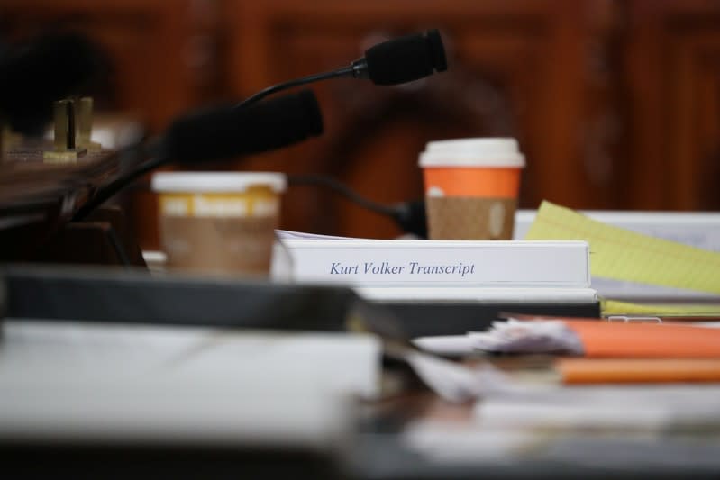 Transcripts lie on the desk of Rep. Elise Stefanik (R-NY) during a House Intelligence Committee hearing as part of the impeachment inquiry in Washington