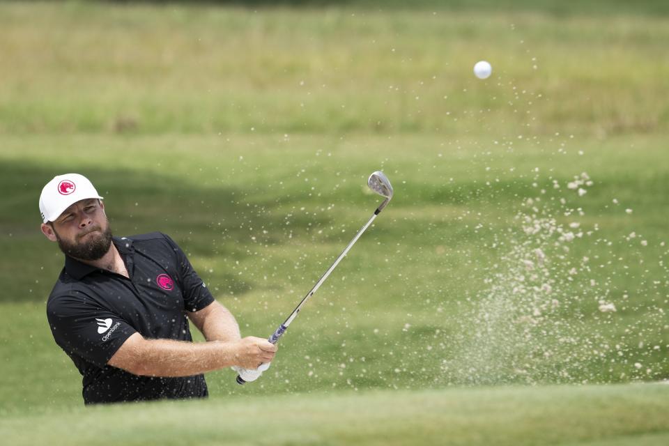 Tyrrell Hatton, of Legion XIII, hits from a bunker on the fifth hole during the final round of LIV Golf Nashville at The Grove, Sunday, June 23, 2024, in College Grove, Tenn. (Charles Laberge/LIV Golf via AP)