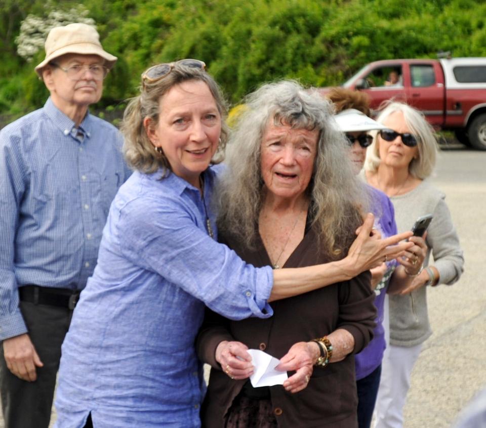 Diane Turco of Harwich and Sarah Thacher of East Dennis embrace with the closing of Pilgrim Nuclear Power Station in Plymouth in May 2019. Ron Schloerb/Cape Cod Times