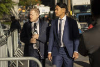 Actor Anthony Rapp, left, arrives at court for the civil lawsuit trial against Kevin Spacey, Thursday, Oct 6, 2022, in New York. Spacey is heading to court to defend himself in a lawsuit filed by Rapp, the actor who was the first in a string of people to publicly accuse the “House of Cards” star of sexual misconduct. (AP Photo/Yuki Iwamura)