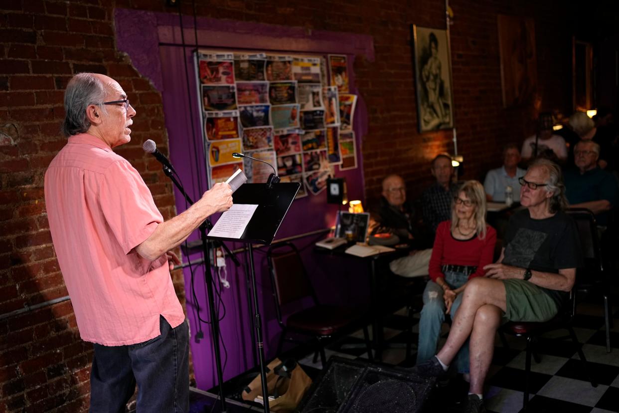 Steve Abbott reads during the weekly Poetry Forum, the longest-running poetry open mic in Ohio, at Bossy Grrls Pin-Up Joint in Old North. The Monday night mainstay is closing after 39 years.