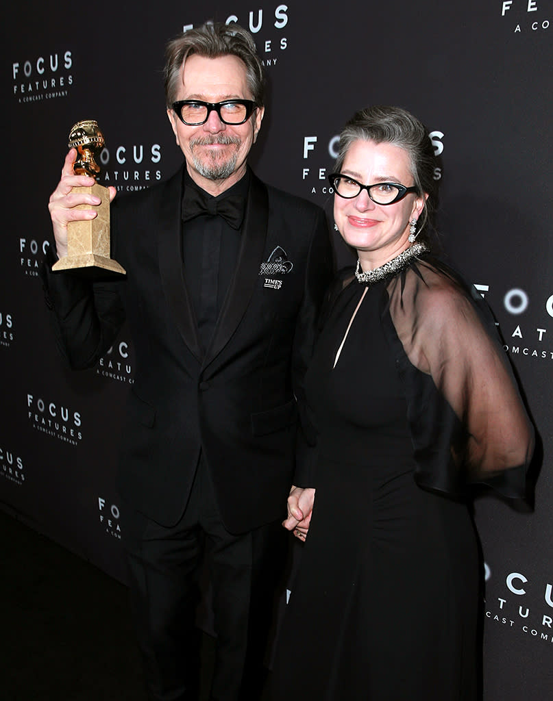 <p>Golden Globe winner Gary Oldman and Gisele Schmidt attend the Focus Features Golden Globe Awards party. (Photo: Rich Fury/Getty Images) </p>