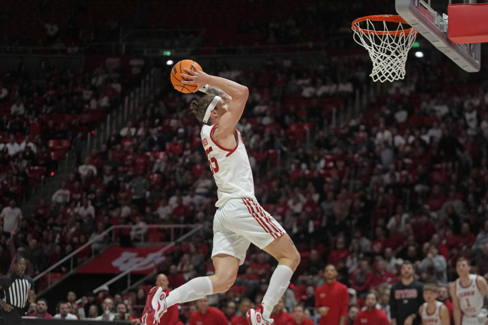 Utah guard Gabe Madsen goes up to dunk against Colorado during the second half of an NCAA college basketball game Saturday, Feb. 3, 2024, in Salt Lake City. (AP Photo/Rick Bowmer)