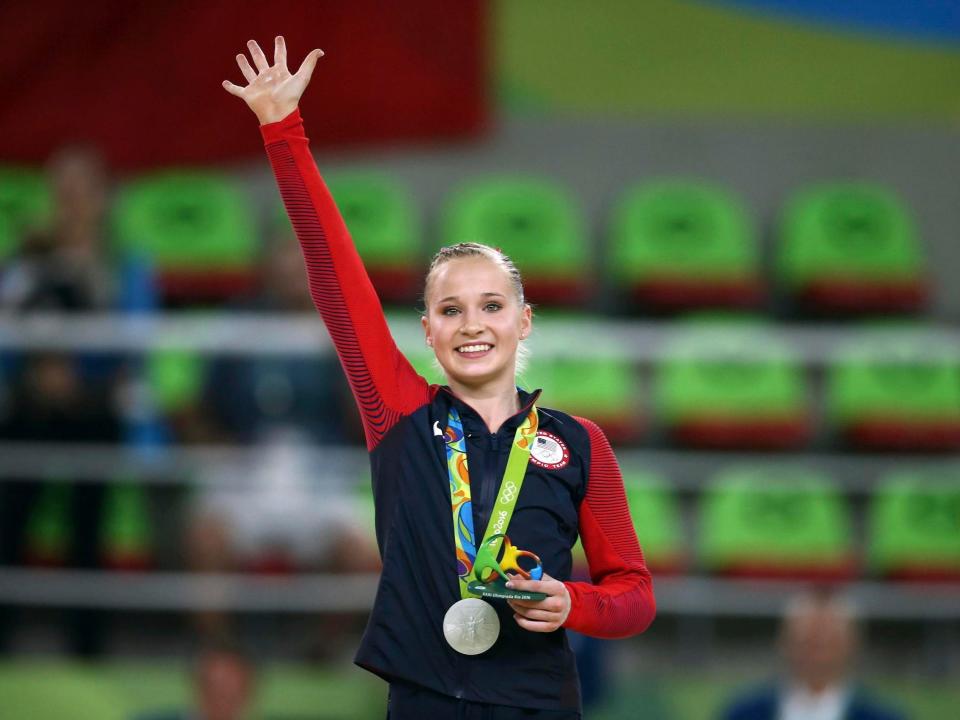 Madison Kocian poses with her silver medal at the 2016 Olympics.