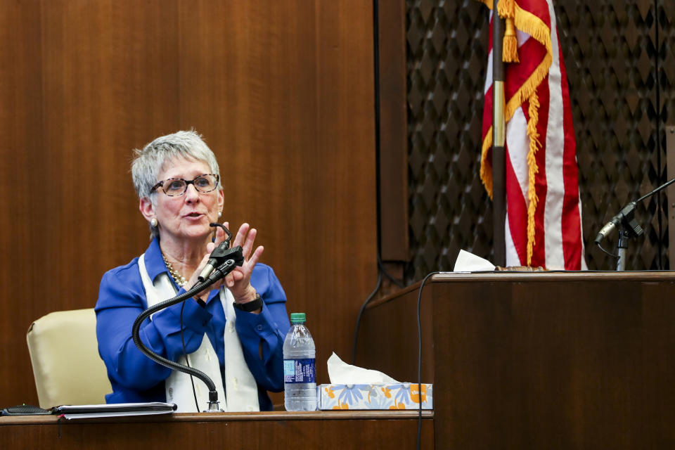 Dr. Carolyn Wiles Higdon testifies during the first day of the retrial of Quinton Tellis in Batesville, Miss., Tuesday, Sept. 25 2018. Tellis is charged with burning 19-year-old Jessica Chambers to death almost three years ago on Dec. 6, 2014. Tellis has pleaded not guilty to the murder. (Brad Vest/The Commercial Appeal via AP, Pool)