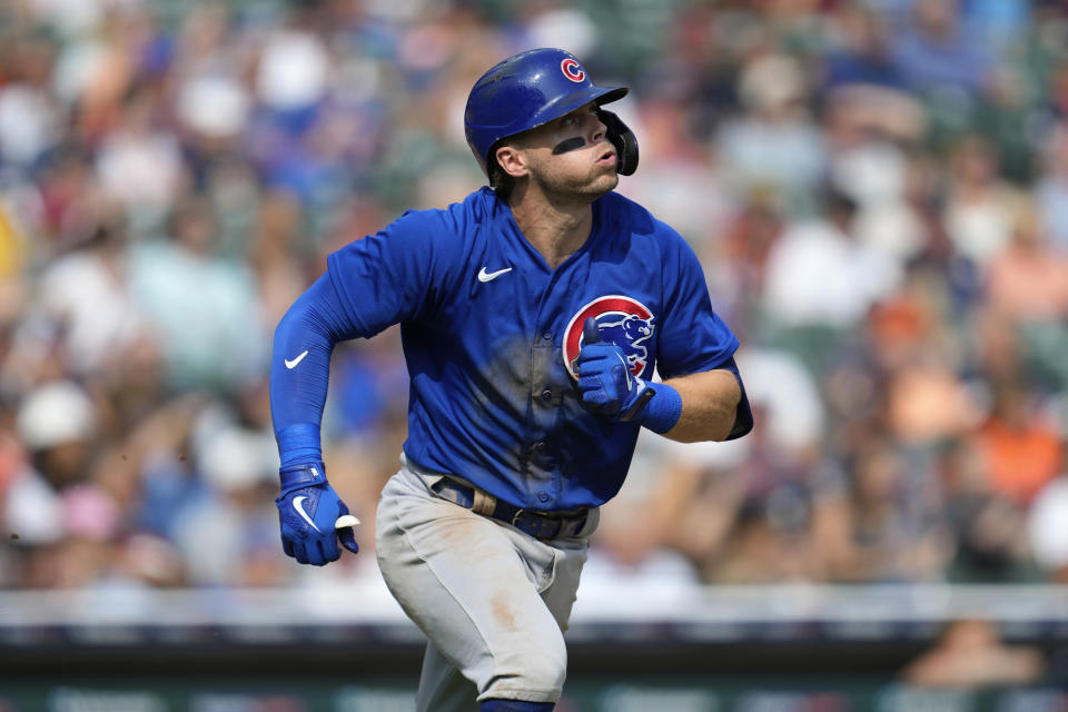 Chicago Cubs' Nico Hoerner hits a sacrifice fly against the Detroit Tigers in the ninth inning of a baseball game, Wednesday, Aug. 23, 2023, in Detroit. (AP Photo/Paul Sancya)
