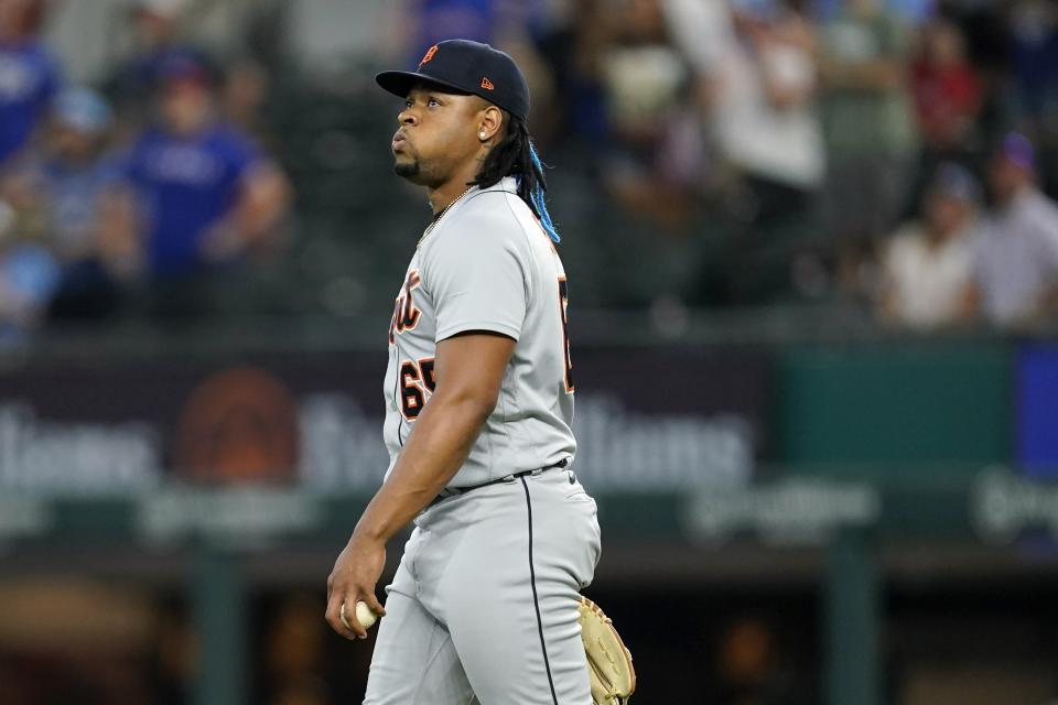 Detroit Tigers relief pitcher Gregory Soto lets out a breath as he walks behind the mound after giving up a two-run home run to Texas Rangers' Corey Seager in the ninth inning of a baseball game in Arlington, Texas, Sunday, Aug. 28, 2022. (AP Photo/Tony Gutierrez)