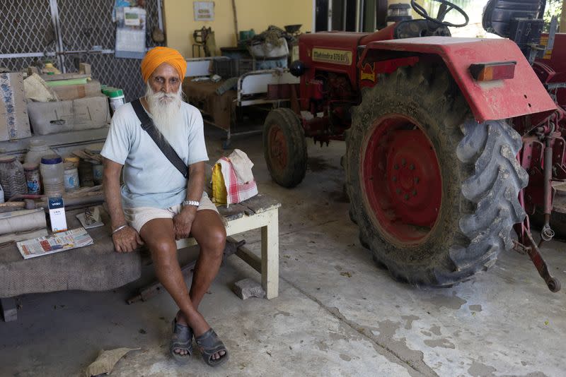 Himmat Singh Nijjar, 79, uncle of Sikh separatist leader Hardeep Singh Nijjar, sits inside his house after an interview with Reuters at village Bharsingpura