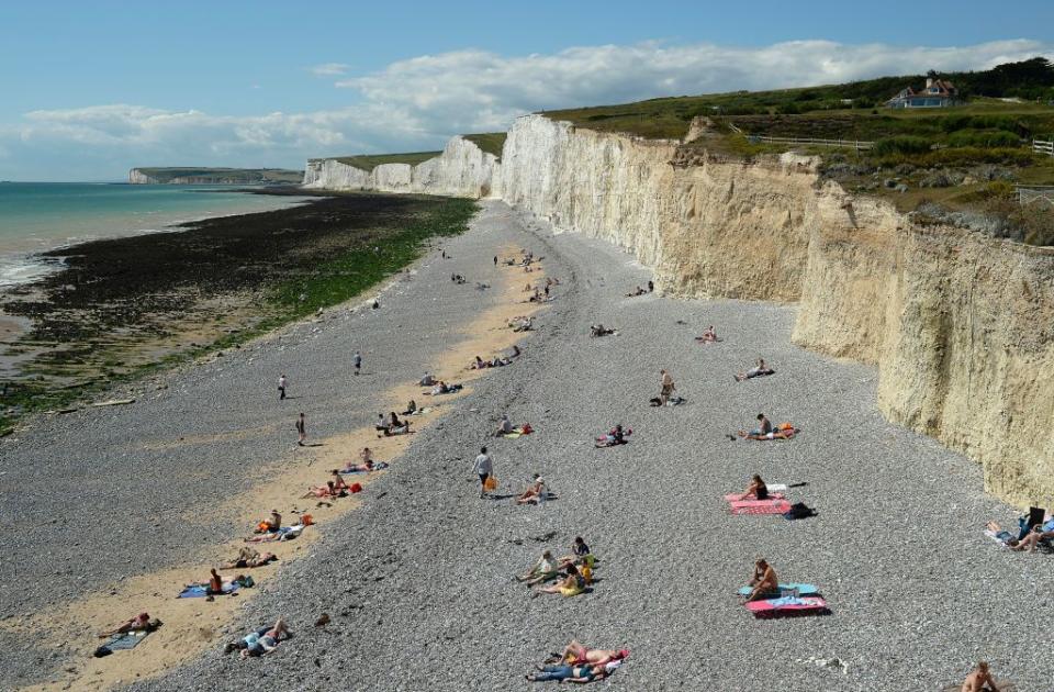 <p>If you want to feel small, just stand near the towering chalk cliffs that line the Seven Sisters coastline. Again, it's pretty steep, but if you want to be able to take in the gorgeous view and find a spot to look out for the Beachy Head Lighthouse, then it's worth bringing along your hiking boots.</p><p><a class="link " href="https://www.airbnb.co.uk/" rel="nofollow noopener" target="_blank" data-ylk="slk:FIND AN AIRBNB;elm:context_link;itc:0;sec:content-canvas">FIND AN AIRBNB</a></p>