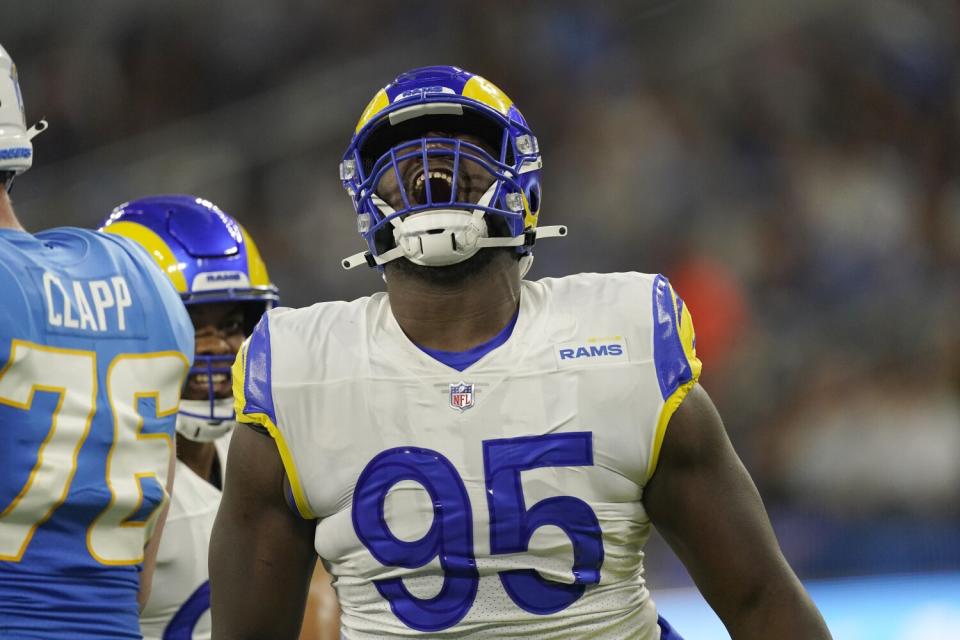 Rams defensive tackle Bobby Brown III celebrates after sacking Chargers quarterback Chase Daniel.