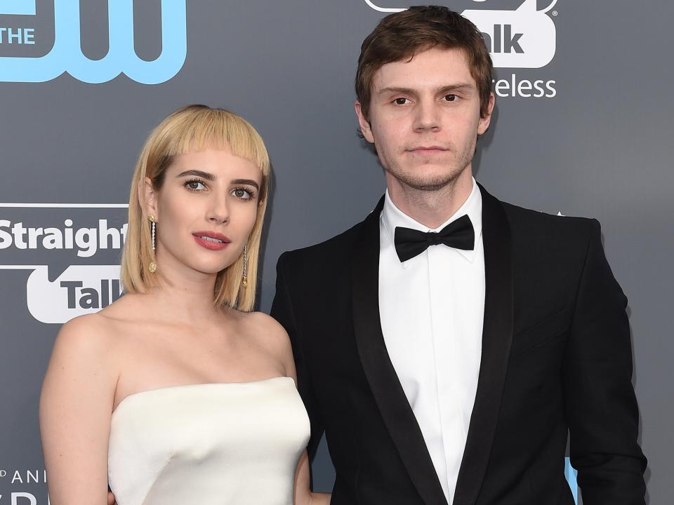 Emma Roberts and Evan Peters attend the 23rd Annual Critics' Choice Awards at Barker Hangar on January 11, 2018 in Santa Monica, California