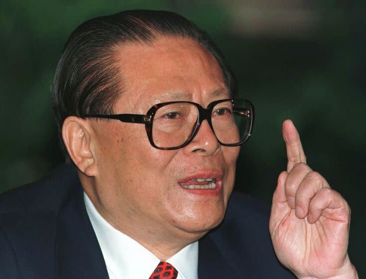 FILE - Chinese then President Jiang Zemin makes a point during a press conference in Beijing, one day before his departure for an eight-day visit to the U.S, Oct. 25, 1997. Jiang has died in Shanghai Wednesday, Nov. 30, 2022, at age 96, according to state media. (AP Photo/Greg Baker, File)