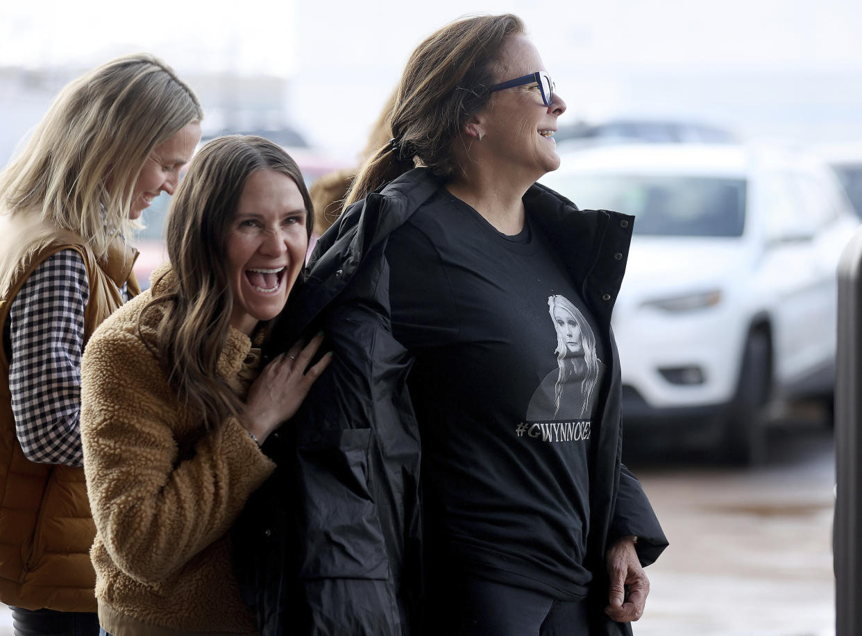 Alli Province hugs Mary Ann Detmering outside the courthouse as Detmering wears a Gwynnocent shirt Thursday, March 30, 2023, in Park City, Utah. A jury found that Gwyneth Paltrow wasn’t to blame for a 2016 collision with a retired optometrist on a beginner run at a posh Utah ski resort during a family vacation. (Kristin Murphy/The Deseret News via AP)