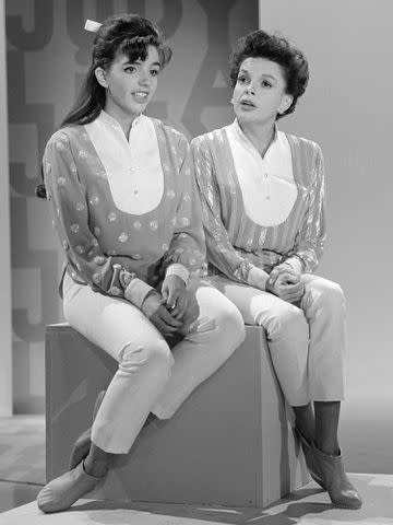 <p>Bettmann</p> Liza Minnelli is shown with her mother, Judy Garland, as the two rehearse for 'The Judy Garland Show'.