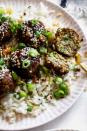 <p>These vegetarian 'meatballs' are fashioned from sauteéd mushrooms and come together with the help of panko breadcrumbs. We love how Jamie Vespa, MS, RD, sneaks in an extra punch of plant-based protein with the help of a chickpea addition.</p><p><em><a href="https://dishingouthealth.com/chili-soy-mushroom-meatballs/" rel="nofollow noopener" target="_blank" data-ylk="slk:Get the recipe from Dishing Out Health »;elm:context_link;itc:0;sec:content-canvas" class="link ">Get the recipe from Dishing Out Health »</a></em></p>