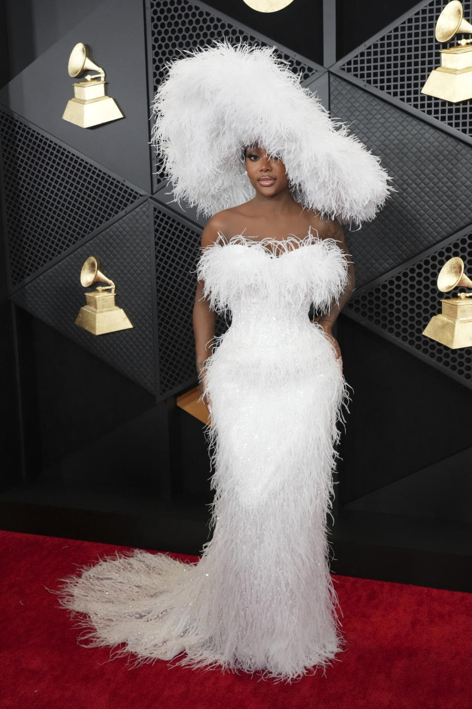 Summer Walker arrives at the 66th annual Grammy Awards on Sunday, Feb. 4, 2024, in Los Angeles. (Photo by Jordan Strauss/Invision/AP)