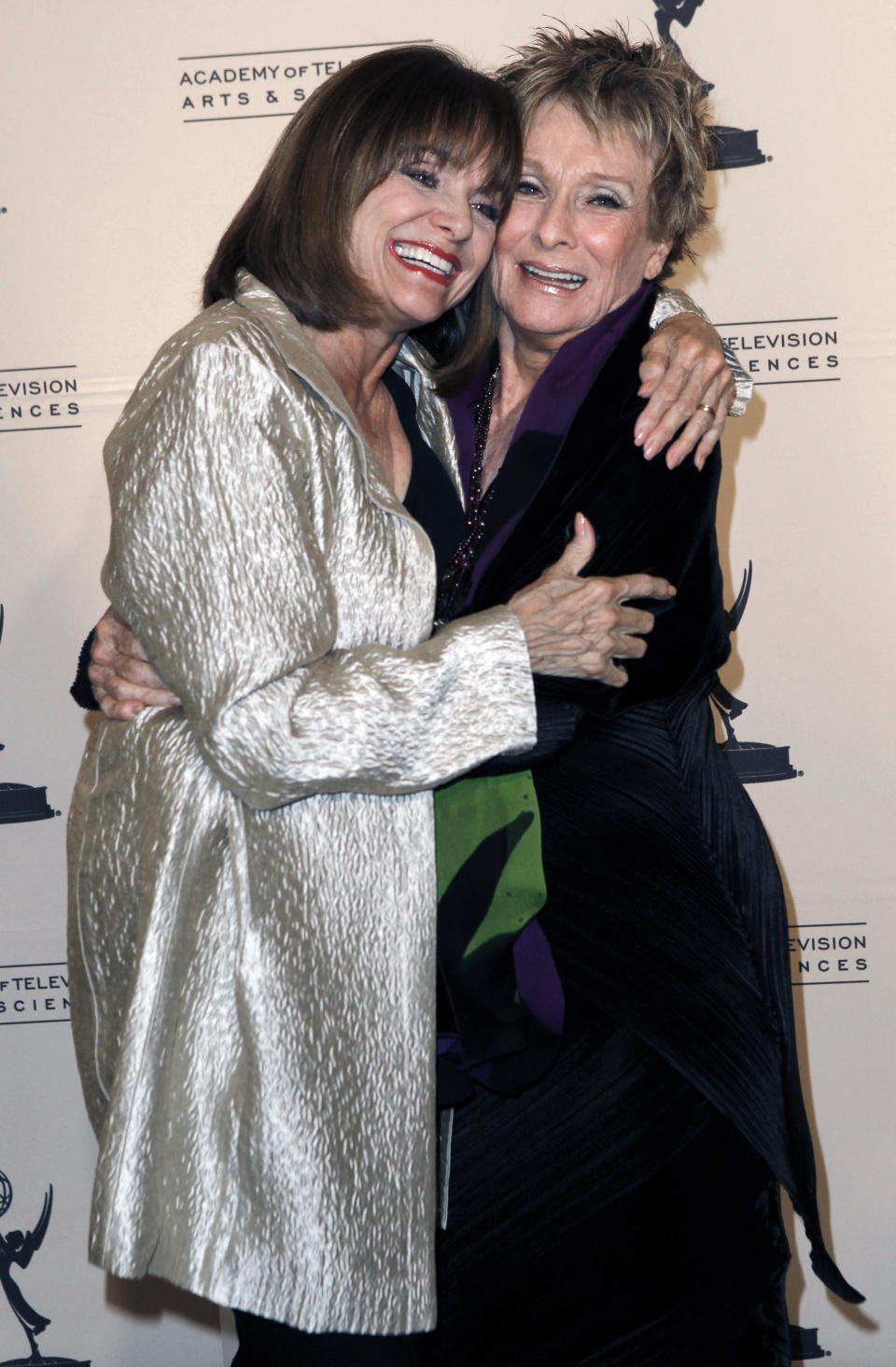 FILE - In this Thursday, Jan. 20, 2011 file photo, Inductee Cloris Leachman, right, and Valerie Harper pose together at the Academy of Television Arts and Sciences 20th Annual Hall of Fame Induction Gala in Beverly Hills, Calif. Valerie Harper, who scored guffaws and stole hearts as Rhoda Morgenstern on back-to-back hit sitcoms in the 1970s, has died, Friday, Aug. 30, 2019. She was 80. (AP Photo/Matt Sayles, File)